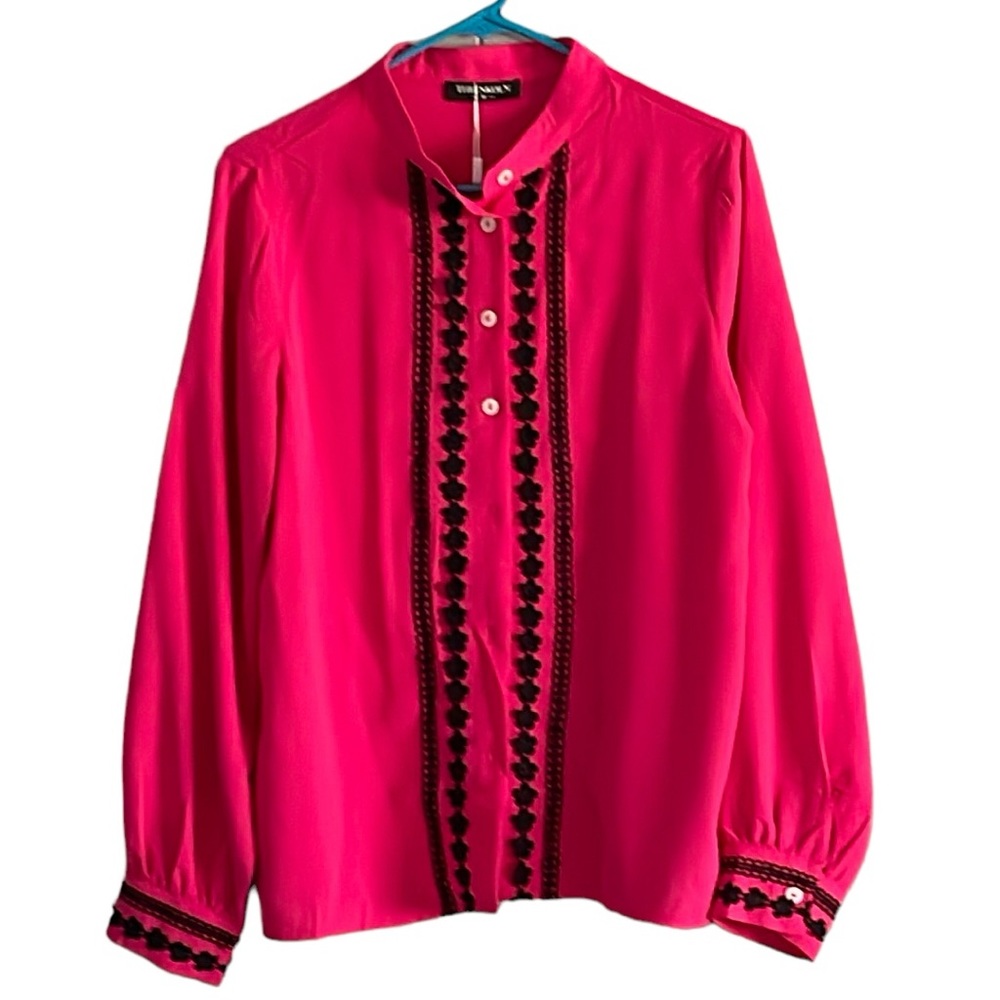 Pink button up shirt with black accents. New with tags.